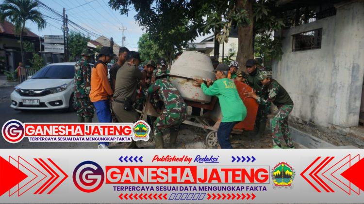 Satgas TMMD Kodim 0735/Surakarta dan Warga Kompak Pindahkan Mesin Molen